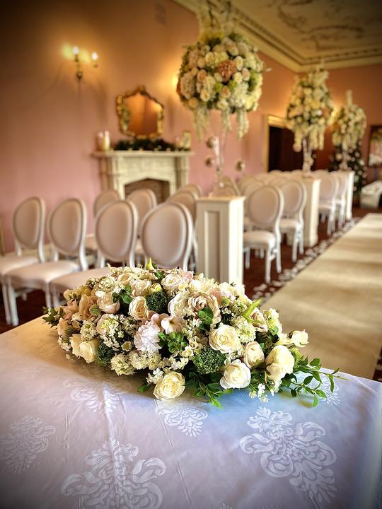 Silk flowers and Louis chairs